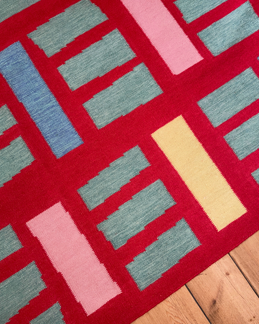 A Collage from our John Booth Workshop Made into a Playful Rug Design