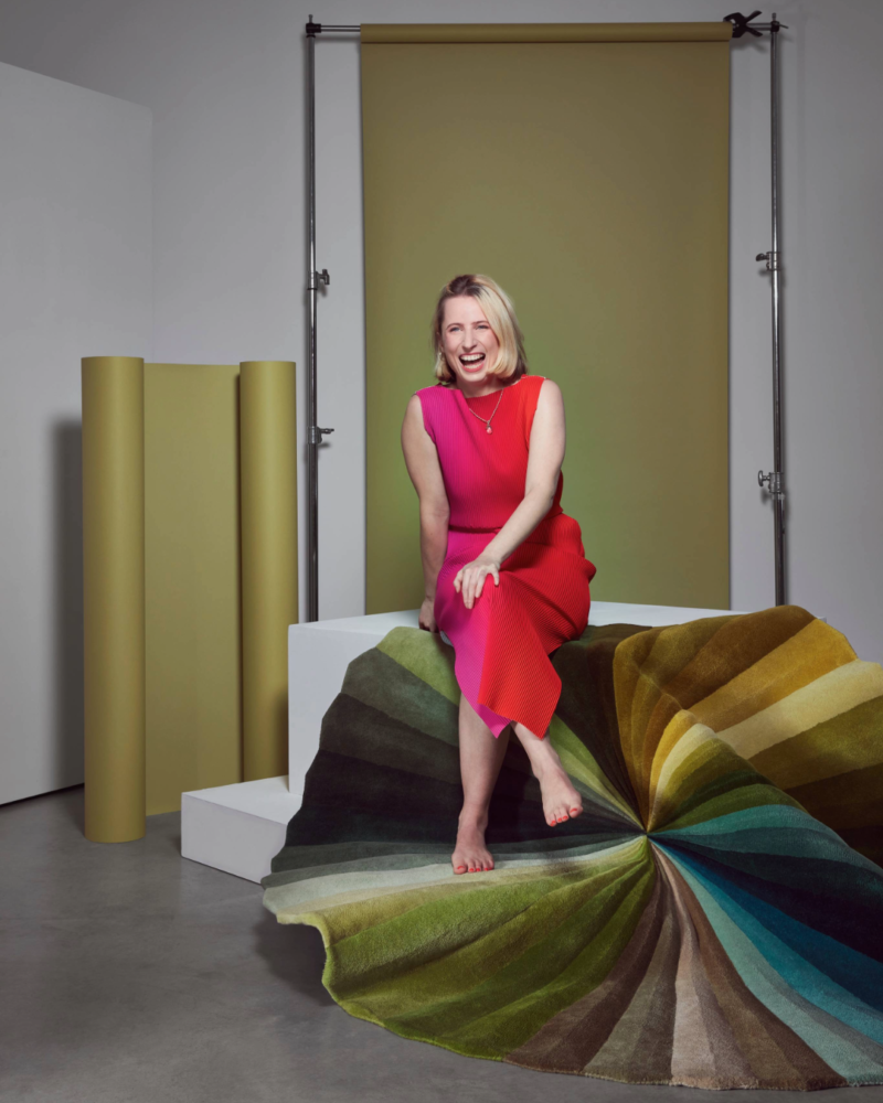 Designer Kitty Joseph with the Chroma Green Rug, photographed by Mark Cocksedge